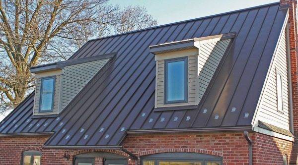 red brick building with slanted metal roof