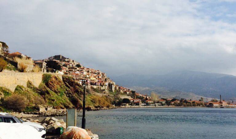 mountains with houses next to the Mediterranean sea