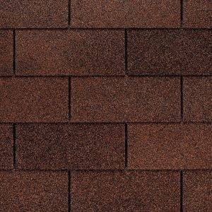 3 tab asphalt roofing shingles next to each other in rows